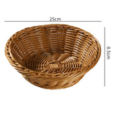 Decorative plastic rattan bowl basket with a classic twist edge, ideal for organizing or displaying items in any room.